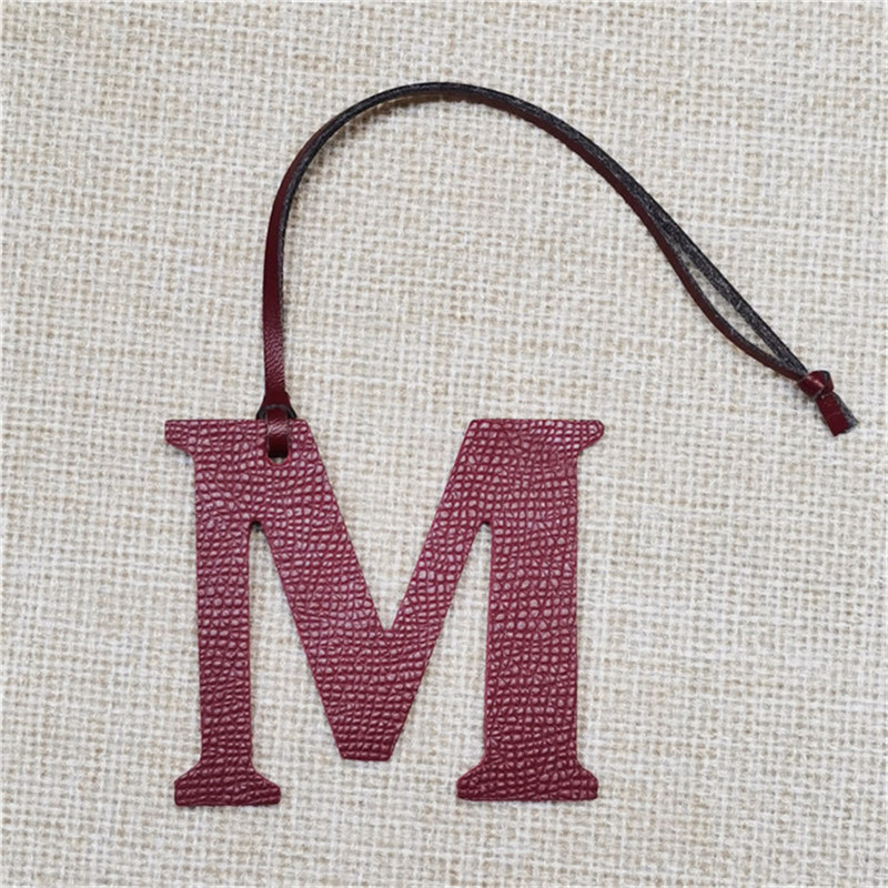 XMESSUN Neuer Englischer Buchs – Monogram Keychain Leather Bewertung und Preis